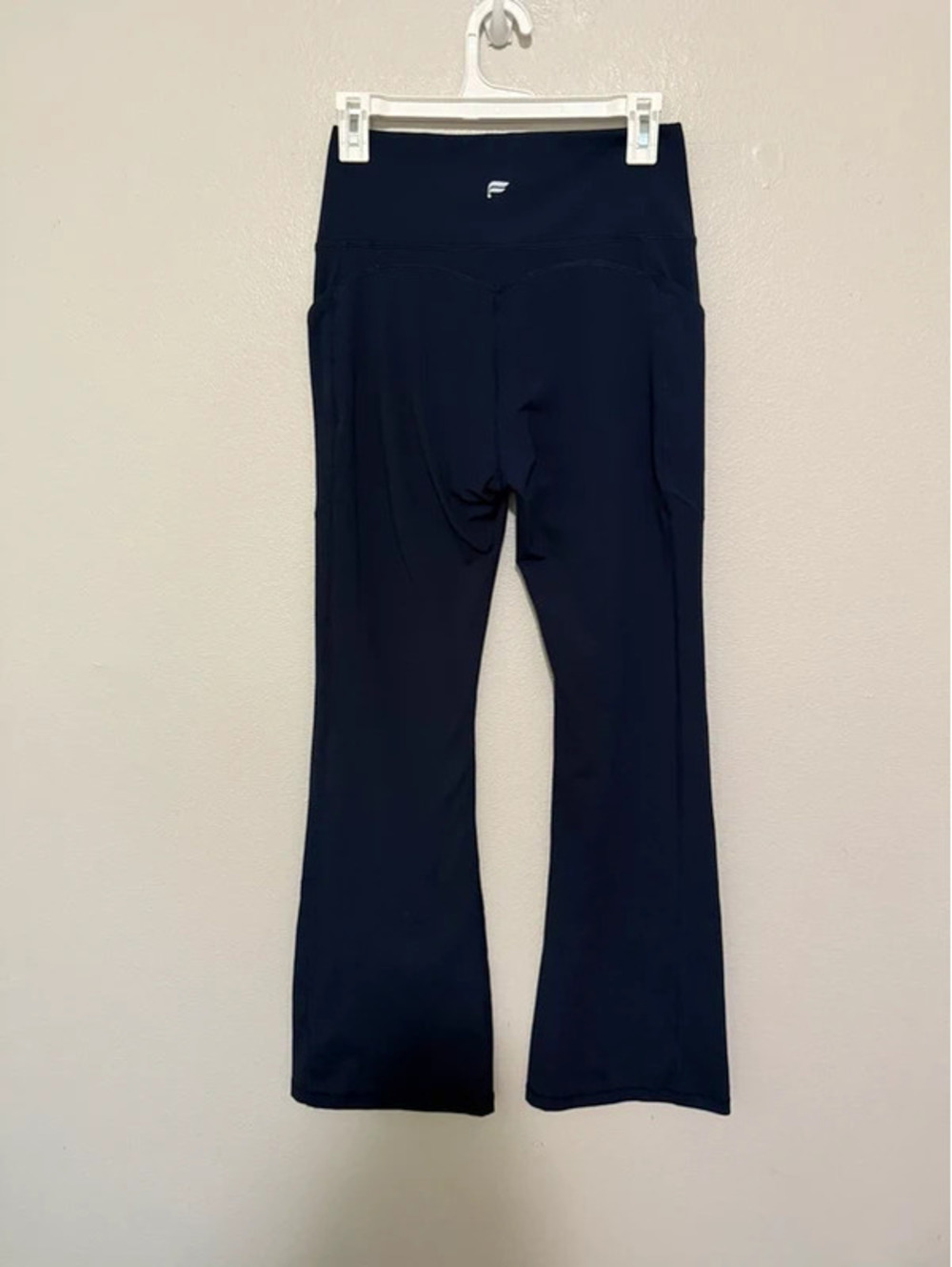 Fabletics navy flares fits like a medium